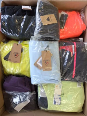 The photo shows a package with footwear in the category AS.