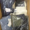 BJ123 1 The photo shows a package with clothing in the category B.