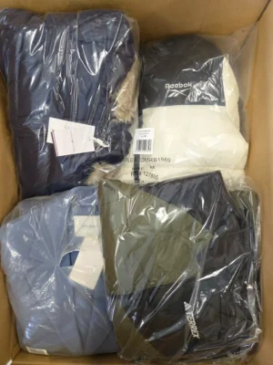 The photo shows a package with clothing in the category B.