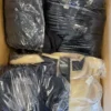 CJ124 1 The photo shows a package with clothing in the category C.