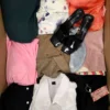 The photo shows a package with clothing in the category BSN.