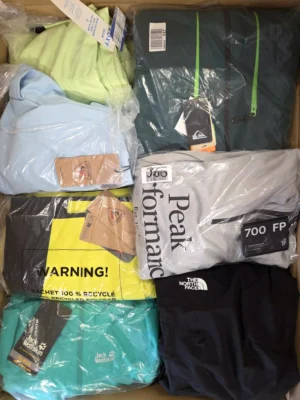 The photo shows a package with footwear in the category AS.