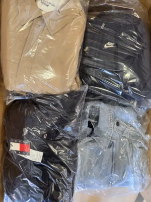 The photo shows a package with clothing in the category C.