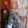 ADN126 2 The photo shows a package with clothing in the category A.