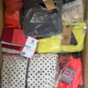The photo shows a package with footwear in the category AS.