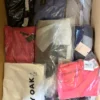 The photo shows a package with clothing in the category A.