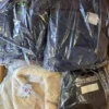 The photo shows a package with clothing in the category B.