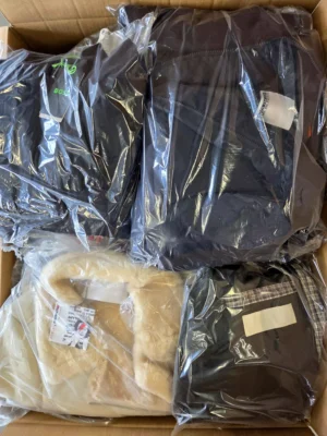 The photo shows a package with clothing in the category B.