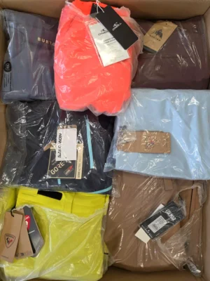 The photo shows a package with footwear in the category AS.