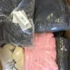 CJ128 1 The photo shows a package with clothing in the category C.