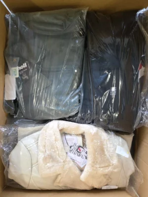 The photo shows a package with clothing in the category B.