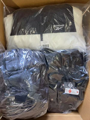 The photo shows a package with clothing in the category B.