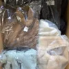 The photo shows a package with clothing in the category B.