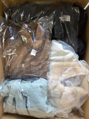 The photo shows a package with clothing in the category B.