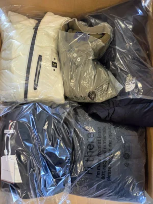 The photo shows a package with clothing in the category C.