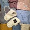 The photo shows a package with clothing in the category BSN.