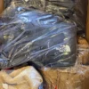 CJ133 1 The photo shows a package with clothing in the category C.