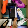 The photo shows a package with footwear in the category AS.