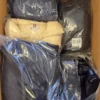 The photo shows a package with clothing in the category C.