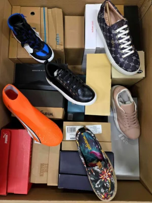 The photo shows a package with footwear in the category AS.