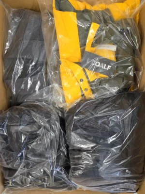 The photo shows a package with clothing in the category B.