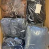 CJ136 1 The photo shows a package with clothing in the category C.