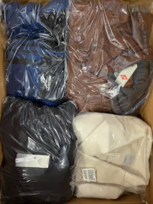 The photo shows a package with clothing in the category B.