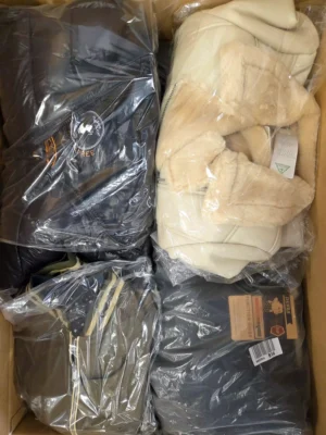 The photo shows a package with clothing in the category B.