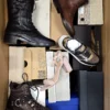 The photo shows a package with footwear in the category AS.