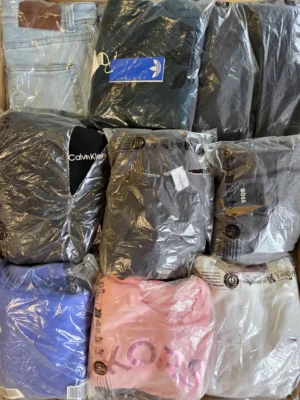 The photo shows a package with clothing in the category D.