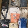 The photo shows a package with clothing in the category D.