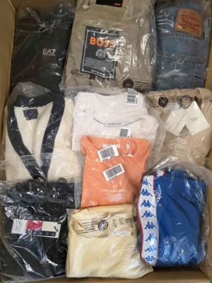 The photo shows a package with clothing in the category D.