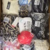 The photo shows a package with clothing in the category B.