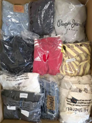 The photo shows a package with clothing in the category D.