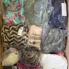 BY161 1 The photo shows a package with clothing in the category B.