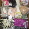 BY164 2 The photo shows a package with clothing in the category B.