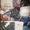 The photo shows a package with clothing in the category B.