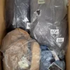 CJ165 2 The photo shows a package with clothing in the category C.