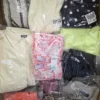 The photo shows a package with clothing in the category B.