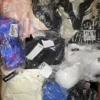 The photo shows a package with clothing in the category B.