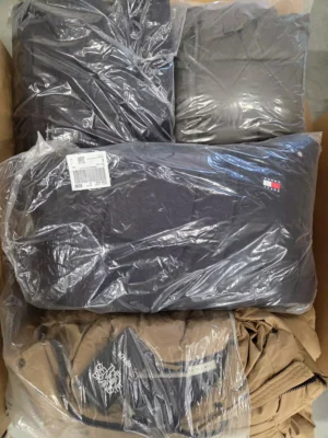 The photo shows a package with clothing in the category C.
