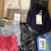 The photo shows a package with clothing in the category B.