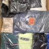 The photo shows a package with clothing in the category B.