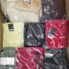 The photo shows a package with clothing in the category B.