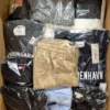 The photo shows a package with clothing in the category B.