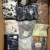 The photo shows a package with clothing in the category B.