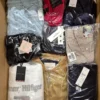 The photo shows a package with clothing in the category B.