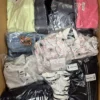 The photo shows a package with clothing in the category B.