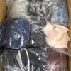 The photo shows a package with clothing in the category C.