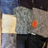 The photo shows a package with clothing in the category U.
